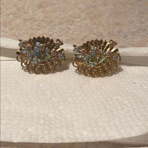Clip-on gold shimmering earrings